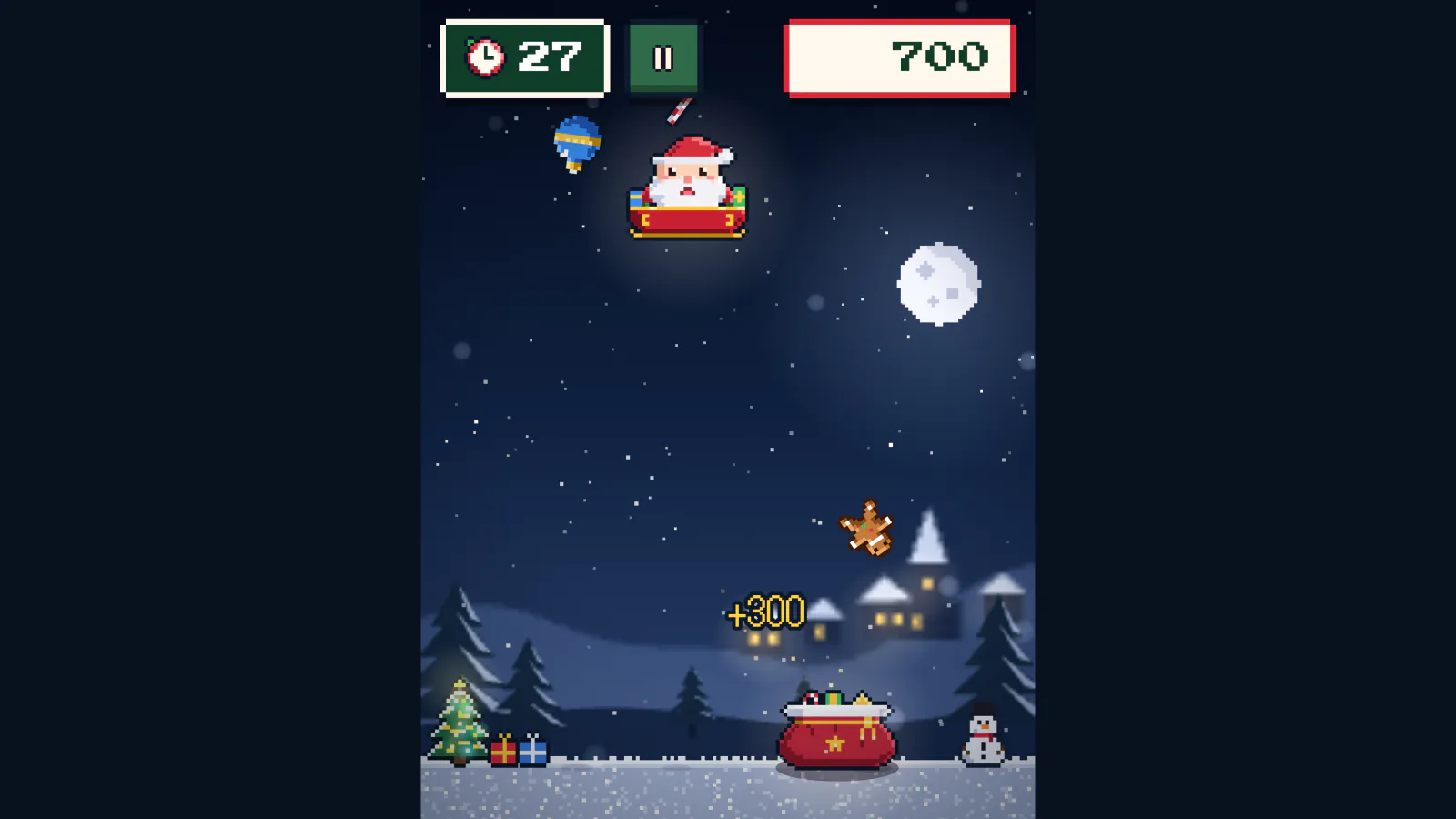 PCのプレイ画面。タイマーは残り27秒、スコアは700点。ソリに乗ったサンタのそばをオーナメントとキャンディケインが飛び、ジンジャークッキーが袋に向かって落ちてくる。袋の上には「+300」が出ている。後ろに満月と雪の村、クリスマスツリーと雪だるま